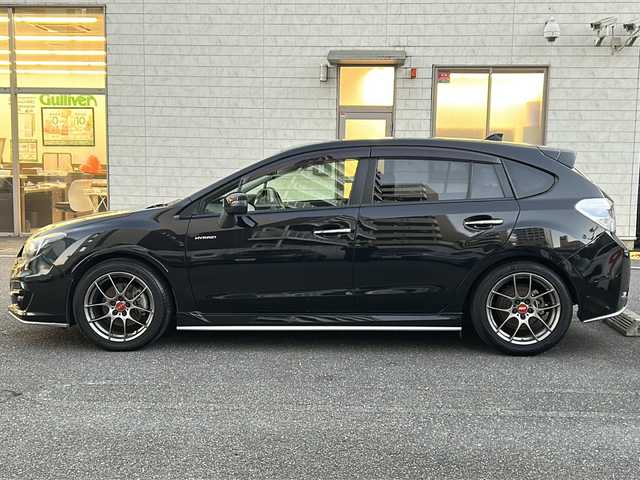 スバル インプレッサ スポーツ HV 2．0i-S アイサイト 埼玉県 2016(平28)年 5.2万km クリスタルブラックシリカ 登録時51141km/アイサイト/純正ディーラーオプションナビ/　CD/DVD/Bluetooth/フルセグTV/HDMI/バックカメラ/レーダークルーズコントロール/レーンキープアシスト/衝突軽減装置/横滑り防止機能/デジタルインナーミラー/社外BBS１７インチAW/プッシュスタート/スマートキー/HID/フォグランプ/パドルシフト/ステアリングリモコン/革巻きハンドル/ハーフレザーシート/純正フロアマット/電動格納ミラー/ウィンカーミラー/プッシュスタート/スマートキー×1/保証書/取扱説明書