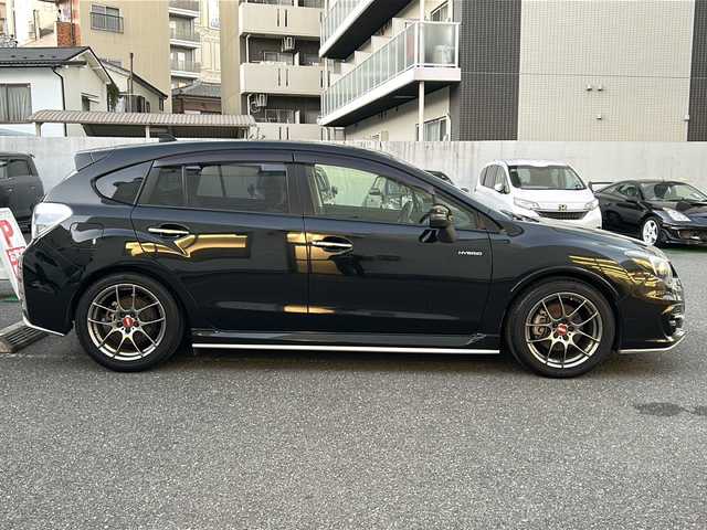 スバル インプレッサ スポーツ HV 2．0i-S アイサイト 埼玉県 2016(平28)年 5.2万km クリスタルブラックシリカ 登録時51141km/アイサイト/純正ディーラーオプションナビ/　CD/DVD/Bluetooth/フルセグTV/HDMI/バックカメラ/レーダークルーズコントロール/レーンキープアシスト/衝突軽減装置/横滑り防止機能/デジタルインナーミラー/社外BBS１７インチAW/プッシュスタート/スマートキー/HID/フォグランプ/パドルシフト/ステアリングリモコン/革巻きハンドル/ハーフレザーシート/純正フロアマット/電動格納ミラー/ウィンカーミラー/プッシュスタート/スマートキー×1/保証書/取扱説明書