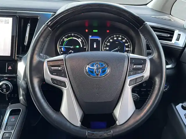トヨタ アルファードハイブリット SR Cパッケージ 群馬県 2019(令1)年 3.9万km ホワイトパールクリスタルシャイン 4WD/ツインムーンルーフ/モデリスタエアロ(F/S/R)/シグネチャーイルミブレード/純正10型ナビ/CD・DVD・SD/Bluetooth・フルセグ/バックカメラ/両側パワースライドドア/デジタルインナーミラー/ビルトインETC2.0/レザーシート・パワーシート/シートヒーター・ベンチレーション/2列目エグゼグティブパワーシート/ステアリングヒーター/追従クルーズコントロール/AC100V1500W/三眼LEDヘッドライト/シーケンシャルターンランプ/横滑り防止装置/レーンキープアシスト/衝突軽減ブレーキ/アイドリングストップ/純正アルミホイール/純正フロアマット/Grgoセキュリティ/取説・保証書/スマートキー×2