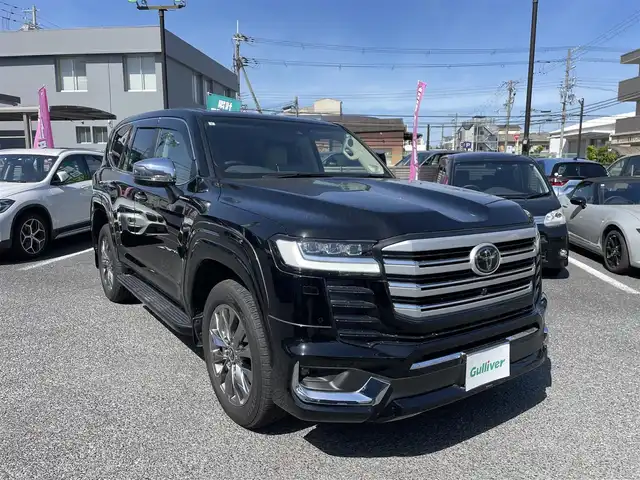トヨタ ランドクルーザー ZX 大阪府 2023(令5)年 0.4万km 黒 モデリスタエアロ/メーカーナビ/・Bluetooth/・フルセグTV/JBLプレミアムサウンド/モデリスタフルエアロ/サンルーフ/レザーシート/ステアリングヒーター/シートヒーター/ベンチレーション/クーラーBOX/リアエンターテイメント/パワーバックドア/360度カメラ/前後カメラドラレコ/ビルトインETC/パワーバックドア/純正フロアマット