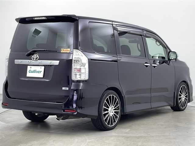 トヨタ ヴォクシー ZS 煌 道央・札幌 2011(平23)年 11.2万km ボルドーマイカメタリック ・寒冷地仕様/・純正ナビ&BT&DVD&CD/・バックカメラ/・両側パワースライドドア/・パドルシフト/・ETC/・フロントワイパーデアイサー/・ウィンカー付きドアミラー/・ドアミラーヒーター/・純正フロアマット/・社外アッパーグリル/・社外ロアビレットグリル/・HIDヘッドライト/・フォグランプ/・オートライト/・スマートキー/・スペアキー/・社外リモコンスターター/・保証書/・取扱説明書