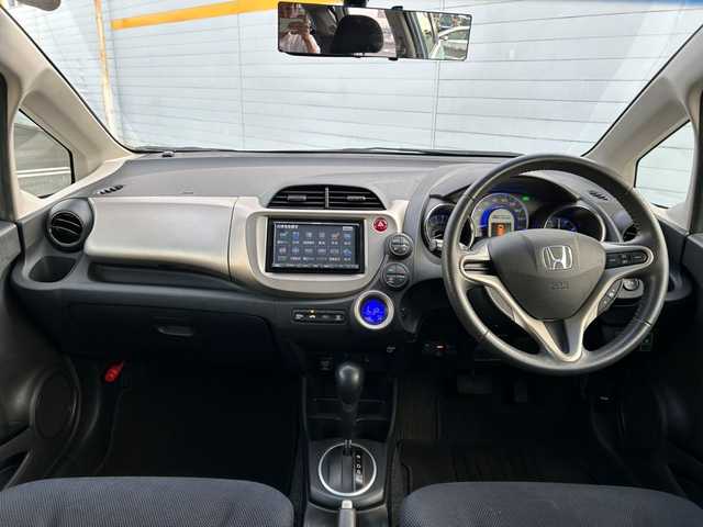 ホンダ フィット ハイブリット スマート セレクション 埼玉県 2012(平24)年 3.5万km ピュアブルーメタリック /ワンオーナー/社外メモリナビ/ワンセグテレビ/ETC/ドアバイザー/アイドリングストップ/DVD再生/横滑り防止装置/クルーズコントロール/ABS/AAC/PS/PW/保証書/取扱説明書/