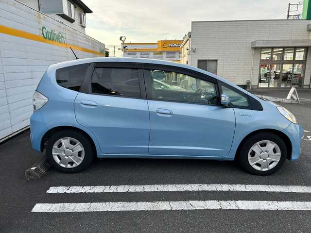 ホンダ フィット ハイブリット スマート セレクション 埼玉県 2012(平24)年 3.5万km ピュアブルーメタリック /ワンオーナー/社外メモリナビ/ワンセグテレビ/ETC/ドアバイザー/アイドリングストップ/DVD再生/横滑り防止装置/クルーズコントロール/ABS/AAC/PS/PW/保証書/取扱説明書/