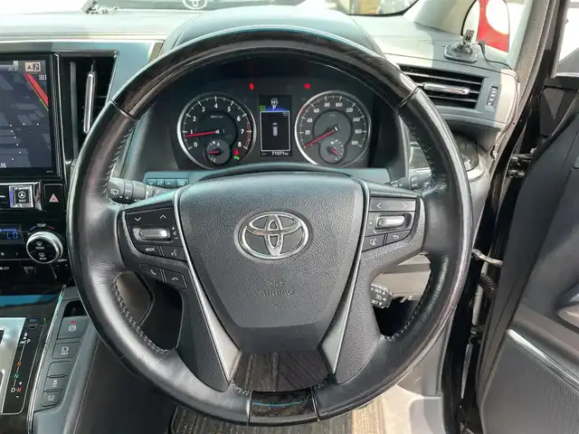 トヨタ ヴェルファイア Z Gエディション 滋賀県 2016(平28)年 7.1万km ブラック 禁煙車/ツインムーンルーフ/アルパイン11インチナビ/【Bluetooth/フルセグTV/CD/DVD】/アルパインフリップダウンモニター/バックカメラ/ビルトインETC/プリクラッシュセーフティ/クルーズコントロール/クリアランスソナー/パワーバックドア/LEDライト/ハーフレザーシート/エグゼクティブパワーシート/パワーオットマン/両側パワースライドドア/スマートキー