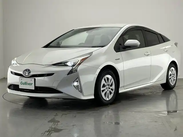 トヨタ プリウス Sセーフティプラス 愛知県 2017(平29)年 8.3万km ホワイトパールクリスタルシャイン 純正ナビ　ＨＵＤ　バックカメラ　禁煙　アドバンストパーク　ＥＴＣ　フルセグＴＶ　Ｂｌｕｅｔｏｏｔｈ　ドラレコ　レーダー探知機　セーフティセンス　衝突軽減　追従クルコン　ＬＥＤオートライト　レーンキープ