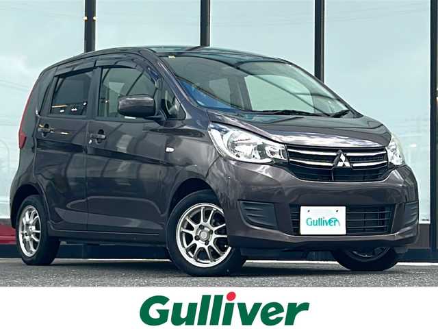 三菱 ｅＫワゴン M 山形県 2018(平30)年 8.7万km オークブラウンメタリック ４WD/ミュージックサーバー/オートエアコン/アイドリングストップ/社外フロアマット/社外14インチアルミホイール/ドアバイザー/横滑り防止装置/ダブル・サイドエアバック/パワーステアリング/パワーウィンドウ/リモコンキー/ベンチシート