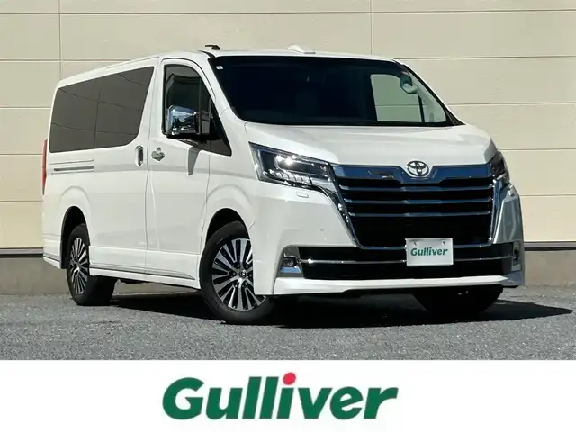 トヨタ グランエース プレミアム 茨城県 2024(令6)年 1万km ホワイトパールクリスタルシャイン 純正ナビ/フルセグTV/Bluetooth接続/全方位カメラ/両側パワースライド/後部座席モニター/シートヒーター/レーダークルーズコントロール/デジタルインナーミラー/ＵＳＢ入力端/３列シート/LEDヘッドライト/ビルトインETC/ベージュ本革シート/純正１７インチアルミホイール