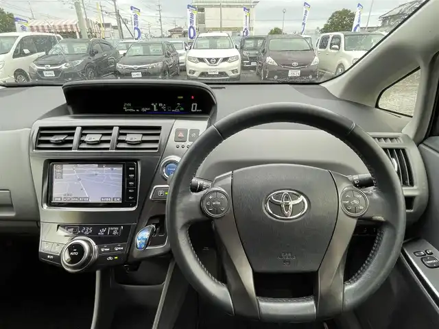 トヨタ プリウス α S チューンブラック 徳島県 2014(平26)年 6.5万km ホワイトパールクリスタルシャイン (株)IDOMが運営する【じしゃロン徳島店】の自社ローン専用車両になりますこちらは現金またはオートローンご利用時の価格です。/自社ローンご希望の方は別途その旨お申付け下さい”	/ワンオーナー/純正ナビゲーション/（フルセグ/CD/DVD/SD/SDREC/Bluetooth)/バックカメラ/ハロゲンオートヘッドライト/ヘッドライトレベリング/フォグランプ/15インチ純正アルミホイール/ウィンカーミラー/プッシュスタート/スマートキー/革巻きステアリング/ステアリングリモコン/EVモード切替/ECO＆Powerモード切替	/カーテンエアバック/純正フロアマット/サイドバイザー