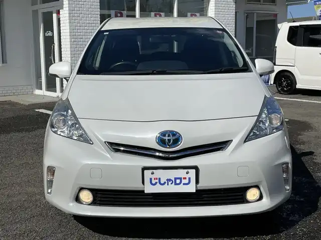 トヨタ プリウス α S チューンブラック 徳島県 2014(平26)年 6.5万km ホワイトパールクリスタルシャイン (株)IDOMが運営する【じしゃロン徳島店】の自社ローン専用車両になりますこちらは現金またはオートローンご利用時の価格です。/自社ローンご希望の方は別途その旨お申付け下さい”	/ワンオーナー/純正ナビゲーション/（フルセグ/CD/DVD/SD/SDREC/Bluetooth)/バックカメラ/ハロゲンオートヘッドライト/ヘッドライトレベリング/フォグランプ/15インチ純正アルミホイール/ウィンカーミラー/プッシュスタート/スマートキー/革巻きステアリング/ステアリングリモコン/EVモード切替/ECO＆Powerモード切替	/カーテンエアバック/純正フロアマット/サイドバイザー