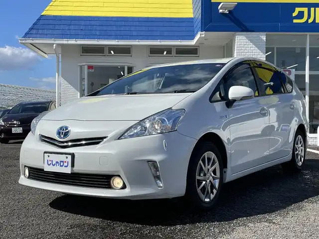 トヨタ プリウス α S チューンブラック 徳島県 2014(平26)年 6.5万km ホワイトパールクリスタルシャイン (株)IDOMが運営する【じしゃロン徳島店】の自社ローン専用車両になりますこちらは現金またはオートローンご利用時の価格です。/自社ローンご希望の方は別途その旨お申付け下さい”	/ワンオーナー/純正ナビゲーション/（フルセグ/CD/DVD/SD/SDREC/Bluetooth)/バックカメラ/ハロゲンオートヘッドライト/ヘッドライトレベリング/フォグランプ/15インチ純正アルミホイール/ウィンカーミラー/プッシュスタート/スマートキー/革巻きステアリング/ステアリングリモコン/EVモード切替/ECO＆Powerモード切替	/カーテンエアバック/純正フロアマット/サイドバイザー