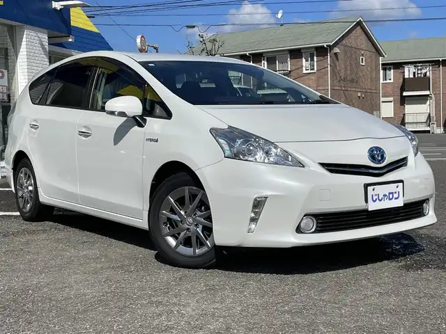 トヨタ プリウス α S チューンブラック 徳島県 2014(平26)年 6.5万km ホワイトパールクリスタルシャイン (株)IDOMが運営する【じしゃロン徳島店】の自社ローン専用車両になりますこちらは現金またはオートローンご利用時の価格です。/自社ローンご希望の方は別途その旨お申付け下さい”	/ワンオーナー/純正ナビゲーション/（フルセグ/CD/DVD/SD/SDREC/Bluetooth)/バックカメラ/ハロゲンオートヘッドライト/ヘッドライトレベリング/フォグランプ/15インチ純正アルミホイール/ウィンカーミラー/プッシュスタート/スマートキー/革巻きステアリング/ステアリングリモコン/EVモード切替/ECO＆Powerモード切替	/カーテンエアバック/純正フロアマット/サイドバイザー