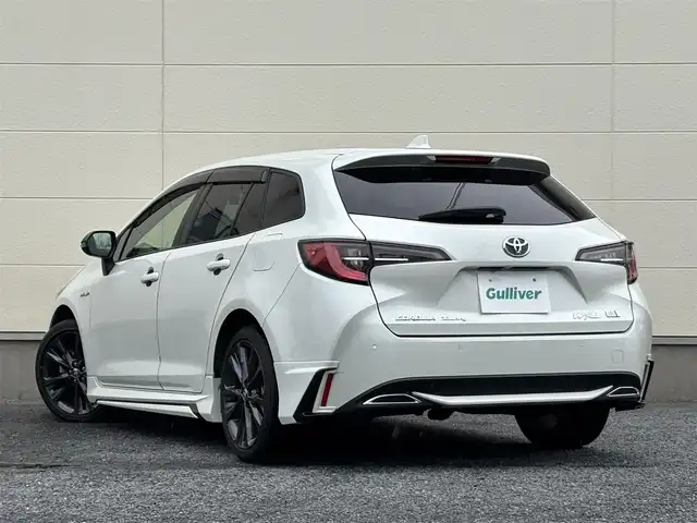 トヨタ カローラツーリング ハイブリッド ダブルバイビー 茨城県 2020(令2)年 7.3万km ホワイトパールクリスタルシャイン モデリスタフルエアロ/純正9インチディスプレイオーディオ/　(AM/FM/BT/TV)/バックカメラ/ETC/ブラインドスポットモニター/クルーズコントロール/レーンキープアシスト/前方ドライブレコーダー/ハーフレザーシート/USB接続/LEDヘッドライト/オートマチックハイビーム/スマートキー/純正フロアマット/純正17インチアルミホイール