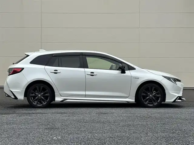 トヨタ カローラツーリング ハイブリッド ダブルバイビー 茨城県 2020(令2)年 7.3万km ホワイトパールクリスタルシャイン モデリスタフルエアロ/純正9インチディスプレイオーディオ/　(AM/FM/BT/TV)/バックカメラ/ETC/ブラインドスポットモニター/クルーズコントロール/レーンキープアシスト/前方ドライブレコーダー/ハーフレザーシート/USB接続/LEDヘッドライト/オートマチックハイビーム/スマートキー/純正フロアマット/純正17インチアルミホイール