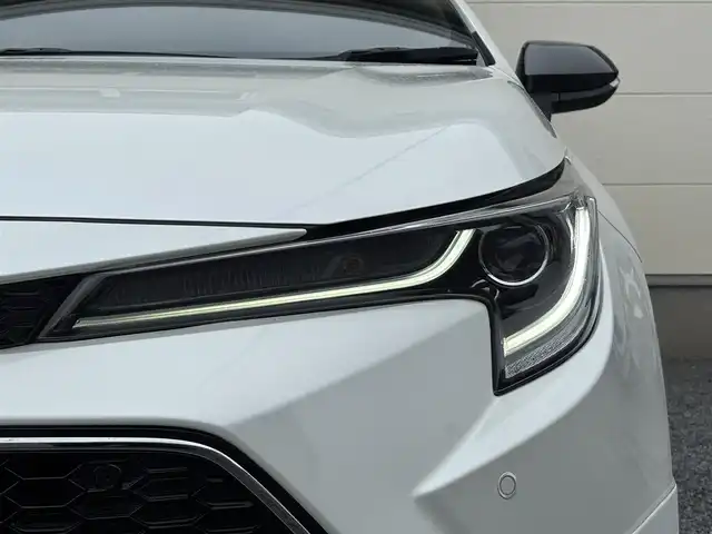 トヨタ カローラツーリング ハイブリッド ダブルバイビー 茨城県 2020(令2)年 7.3万km ホワイトパールクリスタルシャイン モデリスタフルエアロ/純正9インチディスプレイオーディオ/　(AM/FM/BT/TV)/バックカメラ/ETC/ブラインドスポットモニター/クルーズコントロール/レーンキープアシスト/前方ドライブレコーダー/ハーフレザーシート/USB接続/LEDヘッドライト/オートマチックハイビーム/スマートキー/純正フロアマット/純正17インチアルミホイール