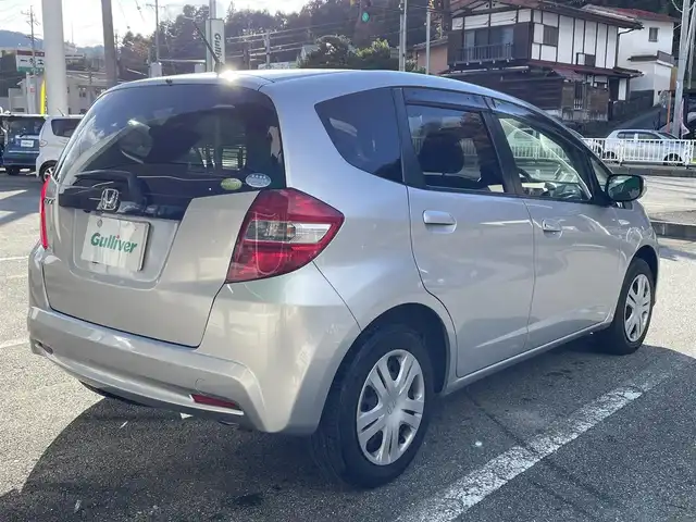 ホンダ フィット G 岐阜県 2011(平23)年 5.6万km アラバスターシルバーメタリック ワンオーナー/4WD/社外ナビ/【CD.AM/FM】/バックカメラ/ETC/盗難防止装置システム/リモコンキー/ABS/ハロゲンヘッドライト/ウィンカーミラー/ドアバイザー/積込スタッドレスタイヤ/保証書/取扱説明書