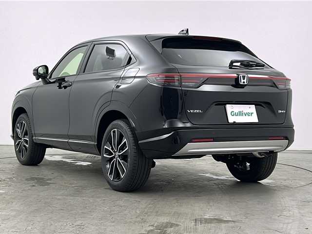 ホンダ ヴェゼル ハイブリッド e:HEV Z 三重県 2025(令7)年 0.1万km未満 クリスタルブラックパール 登録済未使用車/Honda CONNECTディスプレー＋ETC2.0車載器/・フルセグ・Bluetooth・USB・AppleCarPlay・AndroidAuto/バックカメラ/パワーバックドア/ステアリングヒーター/前席シートヒーター/ステアリングヒーター/電動パーキング/パドルシフト/HondaSENSING/・衝突軽減ブレーキ/・誤発進抑制機能/・後方誤発進抑制機能/・渋滞追従機能付アダプティブクルーズコントロール/・車線維持支援システム/・先行車発進お知らせ機能/・オートハイビーム/・パーキングセンサーシステム