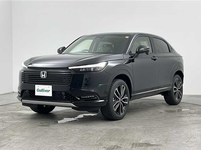 ホンダ ヴェゼル ハイブリッド e:HEV Z 三重県 2025(令7)年 0.1万km未満 クリスタルブラックパール 登録済未使用車/Honda CONNECTディスプレー＋ETC2.0車載器/・フルセグ・Bluetooth・USB・AppleCarPlay・AndroidAuto/バックカメラ/パワーバックドア/ステアリングヒーター/前席シートヒーター/ステアリングヒーター/電動パーキング/パドルシフト/HondaSENSING/・衝突軽減ブレーキ/・誤発進抑制機能/・後方誤発進抑制機能/・渋滞追従機能付アダプティブクルーズコントロール/・車線維持支援システム/・先行車発進お知らせ機能/・オートハイビーム/・パーキングセンサーシステム