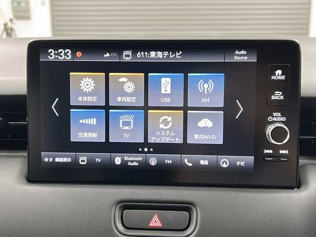 ホンダ ヴェゼル ハイブリッド e:HEV Z 三重県 2025(令7)年 0.1万km未満 クリスタルブラックパール 登録済未使用車/Honda CONNECTディスプレー＋ETC2.0車載器/・フルセグ・Bluetooth・USB・AppleCarPlay・AndroidAuto/バックカメラ/パワーバックドア/ステアリングヒーター/前席シートヒーター/ステアリングヒーター/電動パーキング/パドルシフト/HondaSENSING/・衝突軽減ブレーキ/・誤発進抑制機能/・後方誤発進抑制機能/・渋滞追従機能付アダプティブクルーズコントロール/・車線維持支援システム/・先行車発進お知らせ機能/・オートハイビーム/・パーキングセンサーシステム