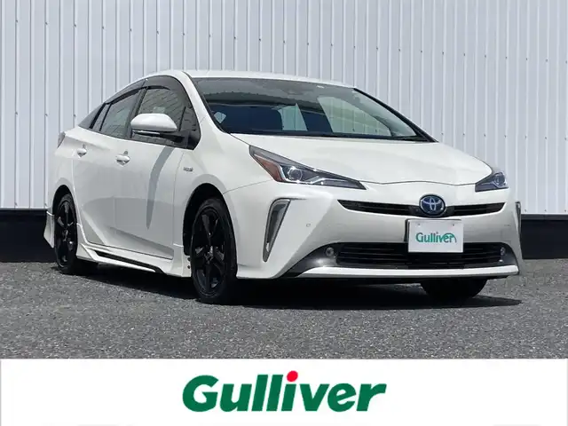 トヨタ プリウス Sツーリングセレクション 千葉県 2019(令1)年 2.7万km ホワイトパールクリスタルシャイン 純正9インチナビ/(フルセグTV/CD/DVD/BT/FM/AM)/パノラミックビューモニター/衝突被害軽減システム/車線逸脱警報/クルーズコントロール/レザーシート/横滑り防止装置/ビルトインETC/ドライブレコーダー/LEDヘッドライト/フォグランプ/オートライト/ウィンカーミラー/電動格納ミラー/純正17インチAW/シートヒーター/シートリフター/プッシュスタート/スマートキー/フロアマット/ドアバイザー/スペアキー/取扱説明書/保証書