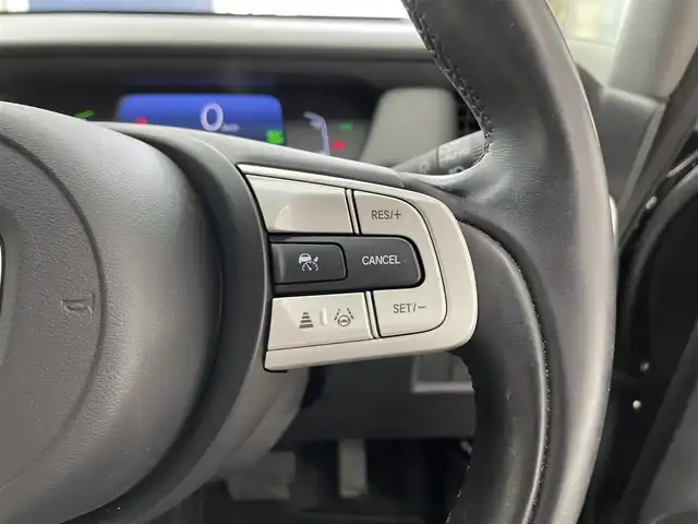 ホンダ フィット e:HEVホーム 滋賀県 2021(令3)年 3.4万km クリスタルブラックパール 禁煙車/純正ナビ/（CD/DVD/SD/Bluetooth/フルセグTV）/バックカメラ/ミラー型前後ドライブレコーダー/ビルトインETC/路外逸脱抑制機能/踏み間違い衝突軽減システム/先行車発進お知らせ/レーンキープアシストシステム/標識認識機能/革巻きステアリング/アダプティブクルーズコントロール/ステアリングリモコン/電動パーキングブレーキ/オートブレーキホールド/USB充電/ハーフレザーシート/LEDヘッドライト/オートヘッドライト/純正アルミホイール/社外フロアマット/スペアキー
