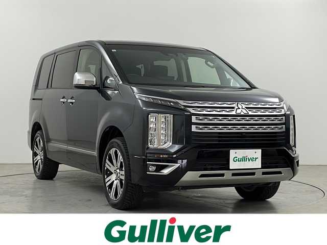 三菱 デリカＤ：５ P 道央・札幌 2024(令6)年 1.7万km グラファイトグレーメタリック/ブラックマイカ ・4WD /ディーゼルターボ/・e-Assist/・電動サイドステップ/・社外10.1型SDナビ/・BT/DVD/CD/SD//・フルセグ/USB(AppleCarPlay)/・マルチアラウンドモニター/・両側パワースライドドア/・パワーバックドア/・レーダークルーズコントロール/・LEDオートライト/・オートマチックハイビーム/・パワーシート/シートヒーター/・ステアリングヒーター/・スマートキー×2/・アイドリングストップ/・ETC/・ドライブレコーダー/・18インチ夏タイヤゴム積込