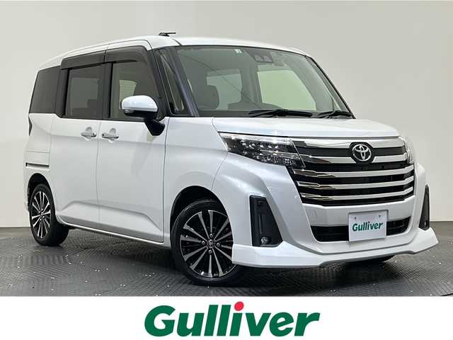 トヨタ ルーミー カスタムG－T 愛媛県 2022(令4)年 3.3万km パールホワイトⅢ ・９型ナビ（フルセグＴＶ・ＢＴ・ＣＤ・ＤＶＤ・ＦＭ・ＡＭ・ＳＤ）/・バックカメラ　/・ＥＴＣ２．０　/・前後ドラレコ　/・両側電動ドア　/・レーダークルコン　/・レーンキープ　/・ＤＮ席シートヒーター　/・ＵＳＢ電源　/・置くだけ充電/・衝突軽減ブレーキ/・オートマチックハイビーム