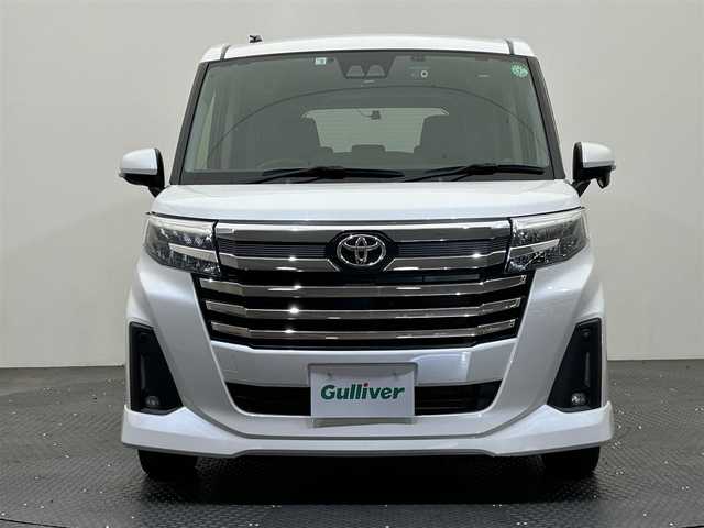 トヨタ ルーミー カスタムG－T 愛媛県 2022(令4)年 3.3万km パールホワイトⅢ ・９型ナビ（フルセグＴＶ・ＢＴ・ＣＤ・ＤＶＤ・ＦＭ・ＡＭ・ＳＤ）/・バックカメラ　/・ＥＴＣ２．０　/・前後ドラレコ　/・両側電動ドア　/・レーダークルコン　/・レーンキープ　/・ＤＮ席シートヒーター　/・ＵＳＢ電源　/・置くだけ充電/・衝突軽減ブレーキ/・オートマチックハイビーム