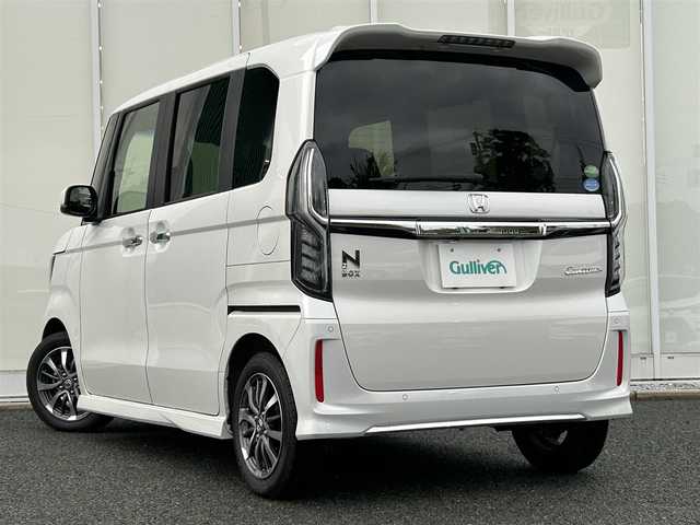ホンダ Ｎ ＢＯＸ L 福岡県 2021(令3)年 3.1万km プラチナホワイトパール ・純正7インチナビ（CD/DVD/フルセグTV/AM/FM/iPod//SD/MusicRack/USB/Bluetooth/AUX/交通情報）/・バックカメラ/・ドライブレコーダー/・社外ETC/・両側パワースライドドア/・クリアランスソナー/・衝突被害軽減システム/・横滑り防止装置/・レーンキープアシスト/・LEDヘッドライト/・追従型クルーズコントロール/・ステアリングスイッチ/・シートヒーター/・電動格納ミラー/・純正サンシェード/・後席用テーブル
