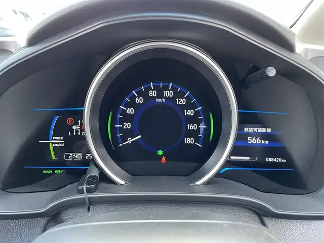 ホンダ フィット ハイブリット Lパッケージ 道北・旭川 2015(平27)年 8.9万km ホワイトオーキッドパール (株)IDOMが運営する【じしゃロン旭川店】の自社ローン専用車両になります。こちらは現金またはオートローンご利用時の価格です。自社ローンご希望の方は別途その旨お申付け下さい・/　/・純正ナビ(CD/DVD/BT/SD/フルセグ)/・バックカメラ/・ETC/・レーダーブレーキ/・クルーズコントロール/・ステアリングリモコン/・プッシュスタート/・スマートキー2個/・フォグランプ/・取扱説明書
