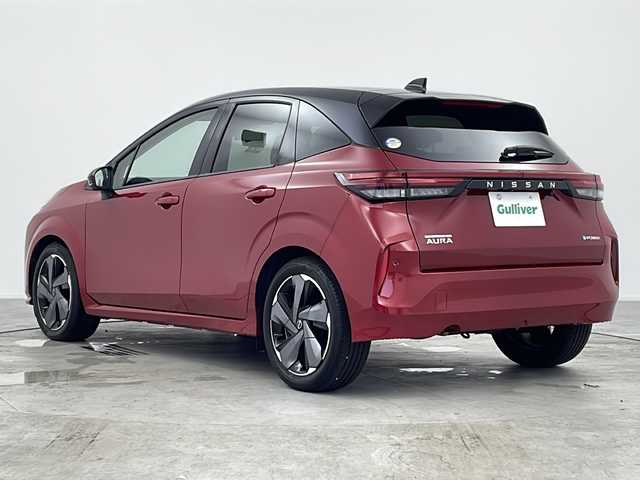 日産 オーラ G レザーエディション 愛知県 2023(令5)年 0.5万km ガーネットレッド/スーパーブラック 2トーン /禁煙車・ワンオーナー車//純正ナビ//フルセグTV・Bluetooth・HDMI・USB//インテリジェントアラウンドビューモニター//ETC2.0//ドライブレコーダー//ワイヤレス充電//BOSE//インテリジェントルームミラー//プロパイロット//本革シート//純正17インチアルミホイール//インテリジェントエマージェンシーブレーキ//ヒルスタートアシスト//踏み間違い衝突防止アシスト//標識検知//インテリジェントFCW(前方衝突予測警報)//車線逸脱警報//インテリジェントDA(ふらつき警報)//インテリジェントLI(車線逸脱防止支援システム)//フロント&バックソナー//インテリジェントBSI(後側方衝突防止支援システム)//BSW(後側方車両検知警報)//RCTA(後退時車両検知警報)//車両検知警報//アイドリングストップ//イモビライザー//横滑り防止//アダプティブLEDヘッドライトシステム//インテリジェントオートライト//フロントフォグランプ//EVモード//プッシュスタート//電子パーキングブレーキ//オートブレーキホールド//ステアリングスイッチ//純正フロアマット//スペアキー2本//新車保証書//取扱説明書/ナビ説明書
