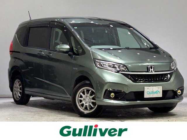 ホンダ フリード ハイブリット G ホンダセンシング 宮城県 2022(令4)年 8.1万km シルバーミストグリーンM 4WD/ホンダセンシング/・衝突軽減ブレーキ/・誤発進抑制機能/・後方誤発進抑制機能/・歩行者事故低減ステアリング/・アダプティブクルーズコントロール/・車線維持支援システム/・路外逸脱抑制機能/・標識認識機能/・先行車発進お知らせ機能/社外ナビ（CN-F1X10BHD）/・Bluetooth/CD/DVD//・フルセグTV/HDMI/Blu-ray/・純正ビルドインETC/・バックカメラ/・ドライブレコーダー前方/・デジタルインナーミラー/両側パワースライドドア/オービスレーダー/革巻きステアリング/・ステアリングスイッチ/プッシュスタート/・リモコンキー/・スペアキー/布シート/・シートヒーター（運転席＋助手席）/3列シート/オートライト/オートマチックハイビーム/ワイパーヒーター/フォグランプ/純正LEDヘッドライト/純正15インチアルミホイール