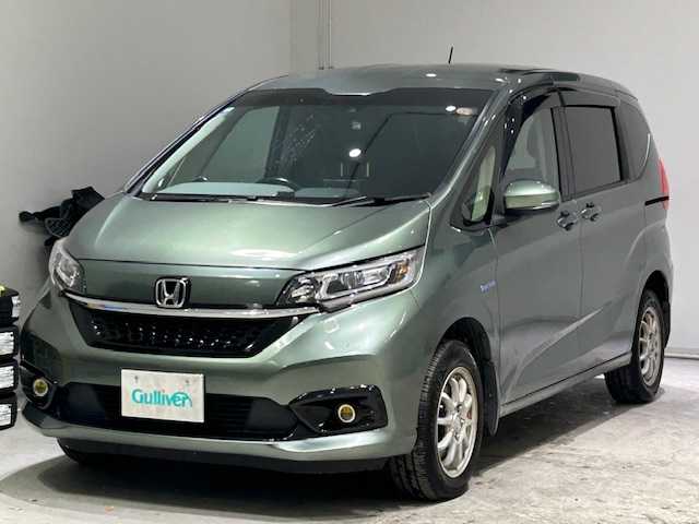 ホンダ フリード ハイブリット G ホンダセンシング 宮城県 2022(令4)年 8.1万km シルバーミストグリーンM 4WD/ホンダセンシング/・衝突軽減ブレーキ/・誤発進抑制機能/・後方誤発進抑制機能/・歩行者事故低減ステアリング/・アダプティブクルーズコントロール/・車線維持支援システム/・路外逸脱抑制機能/・標識認識機能/・先行車発進お知らせ機能/社外ナビ（CN-F1X10BHD）/・Bluetooth/CD/DVD//・フルセグTV/HDMI/Blu-ray/・純正ビルドインETC/・バックカメラ/・ドライブレコーダー前方/・デジタルインナーミラー/両側パワースライドドア/オービスレーダー/革巻きステアリング/・ステアリングスイッチ/プッシュスタート/・リモコンキー/・スペアキー/布シート/・シートヒーター（運転席＋助手席）/3列シート/オートライト/オートマチックハイビーム/ワイパーヒーター/フォグランプ/純正LEDヘッドライト/純正15インチアルミホイール