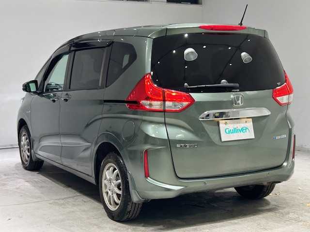 ホンダ フリード ハイブリット G ホンダセンシング 宮城県 2022(令4)年 8.1万km シルバーミストグリーンM 4WD/ホンダセンシング/・衝突軽減ブレーキ/・誤発進抑制機能/・後方誤発進抑制機能/・歩行者事故低減ステアリング/・アダプティブクルーズコントロール/・車線維持支援システム/・路外逸脱抑制機能/・標識認識機能/・先行車発進お知らせ機能/社外ナビ（CN-F1X10BHD）/・Bluetooth/CD/DVD//・フルセグTV/HDMI/Blu-ray/・純正ビルドインETC/・バックカメラ/・ドライブレコーダー前方/・デジタルインナーミラー/両側パワースライドドア/オービスレーダー/革巻きステアリング/・ステアリングスイッチ/プッシュスタート/・リモコンキー/・スペアキー/布シート/・シートヒーター（運転席＋助手席）/3列シート/オートライト/オートマチックハイビーム/ワイパーヒーター/フォグランプ/純正LEDヘッドライト/純正15インチアルミホイール