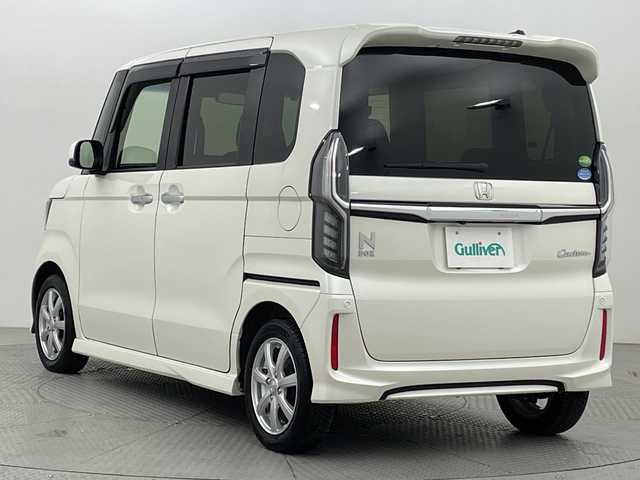 ホンダ Ｎ ＢＯＸ カスタム G L ホンダセンシング 新潟県 2017(平29)年 2.1万km プレミアムホワイトパールⅡ ホンダセンシング/シーケンシャルウィンカー/SDナビ/　CD/DVD/Bluetooth/フルセグTV/バックカメラ/左側パワースライドドア/レーダークルーズコントロール/LEDオート－ライト/14インチアルミホイール/ウィンカーミラー/電格ミラー/レーンキープアシスト/スマートキー/ビルトインETC