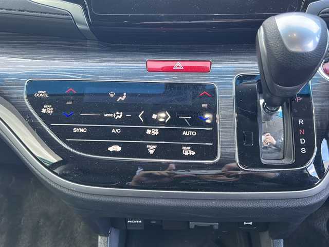 ホンダ オデッセイ ハイブリッド 福島県 2017(平29)年 8.5万km ホワイトオーキッドパール 純正ナビ　/(CD/DVD/BT/フルセグTV)/HDMI/純正フリップダウンモニター/全周囲カメラ/バックカメラ/両側パワースライドドア/クルーズコントロール追従あり/ホンダセンシング/前方ドライブレコーダー/Ｄ席パワーシート/Ｄ席Ｎ席シートヒーター/レザーシート/ビルトインＥＴＣ/純正17インチアルミホイール/LEDヘッドライト