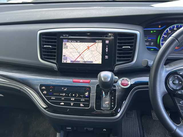 ホンダ オデッセイ ハイブリッド 福島県 2017(平29)年 8.5万km ホワイトオーキッドパール 純正ナビ　/(CD/DVD/BT/フルセグTV)/HDMI/純正フリップダウンモニター/全周囲カメラ/バックカメラ/両側パワースライドドア/クルーズコントロール追従あり/ホンダセンシング/前方ドライブレコーダー/Ｄ席パワーシート/Ｄ席Ｎ席シートヒーター/レザーシート/ビルトインＥＴＣ/純正17インチアルミホイール/LEDヘッドライト