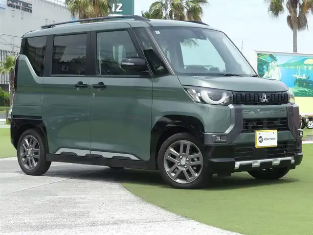 三菱 デリカミニ T プレミアム 千葉県 2024(令6)年 0.1万km未満 緑Ⅱ 届出済未使用車/全方位カメラ/衝突軽減ブレーキ/レーンキープアシスト/レーダークルーズコントロール/標識認識機能/先行車発進告知/ヒルディセントコントロール/純正メモリナビ/　Bluetooth/AppleCarplay/　AndroidAuto/フルセグTV/ステアリングスイッチ/パドルシフト/ステアリングヒーター/電動パーキングブレーキ/アイドリングストップ/ハーフレザーシート/前席シートヒーター/両側パワースライドドア/LEDヘッドライト/オートライト/オートハイビーム/フォグランプ/ウィンカーミラー/スペアキー1本