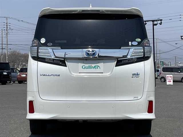 トヨタ ヴェルファイア ハイブリット ZR Gエディション 道央・札幌 2015(平27)年 7.2万km ホワイトパールクリスタルシャイン ４WD/寒冷地仕様/JBLプレミアムサウンドシステム/純正ディーラーOPナビ/CD/DVD/BT/フルセグ/純正フリップダウンモニター/プリクラッシュセーフティ/横滑り防止装置/レーダークルーズコントロール/クリアランスソナー/アラウンドビューモニター/ビルトインETC/ドライブレコーダー/EVMODE/ECOMODE/自動防眩ミラー/両側パワースライドドア/パワーバックドア/前席/２列目パワーシート/前席シートヒーター/D席メモリーシート/N席/２列目オットマン/レザーシート/革巻きステアリング/ステアリングリモコン/ハンドルヒーター/AC100V/電動パーキング/ブレーキホールド/レーダー探知機/MTモード付AT/プッシュスタート/スマートキー/LEDヘッドライト/オートライト/オートハイビーム/フォグランプ/電動格納ミラー/ウィンカーミラー/純正ラバーフロアマット/スペアキー