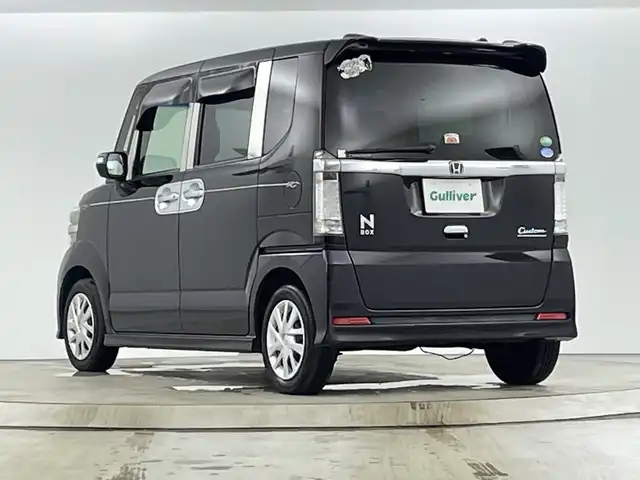ホンダ Ｎ ＢＯＸ カスタム G Lパッケージ 愛知県 2013(平25)年 10.5万km プレミアムゴールドパープルパール ディーラーOPナビ（AM/FM/ワンセグ/BT/CD/DVD）/バックカメラ/両側パワースライドドア/プッシュスタート/スマートキー/オートライト/電格ミラー/社外シートカバー/ステアリングスイッチ/純正ホイールキャップ/ドアバイザー/ETC/横滑り防止機能/アイドリングストップ/フォグランプ