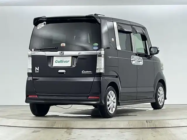 ホンダ Ｎ ＢＯＸ カスタム G Lパッケージ 愛知県 2013(平25)年 10.5万km プレミアムゴールドパープルパール ディーラーOPナビ（AM/FM/ワンセグ/BT/CD/DVD）/バックカメラ/両側パワースライドドア/プッシュスタート/スマートキー/オートライト/電格ミラー/社外シートカバー/ステアリングスイッチ/純正ホイールキャップ/ドアバイザー/ETC/横滑り防止機能/アイドリングストップ/フォグランプ