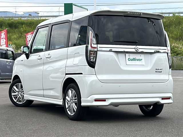 スズキ ソリオ HV MX 青森県 2024(令6)年 2.6万km ピュアホワイトP ・4WD/・衝突軽減ブレーキ/・レーンキープアシスト/・レーダークルーズコントロール/・社外ナビ/・バックカメラ/・Bluetooth/・片側パワースライドドア/・スマートキー/・プッシュスタート/・バックセンサー/・シートヒーター/・オートライト/・オートマチックハイビーム/・社外ETC/・保証書・取説あり