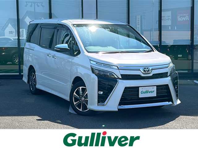 トヨタ ヴォクシー ZS 煌Ⅲ 岐阜県 2020(令2)年 5.1万km ホワイトパールクリスタルシャイン 登録時走行距離50126km/純正９型ナビ　/フルセグ　/バックカメラ　/両側パワースライドドア　/プリクラッシュセーフティ　/クルーズコントロール　/前後コーナーセンサー　/前後ドライブレコーダー　/ＬＥＤヘッドライト　/オートライト/オートハイビーム/ビルトインＥＴＣ　/スマートキー/プッシュスタート/ドアバイザー/ウィンカーミラー/背面テーブル/純正16インチアルミホイール/純正フロアマット