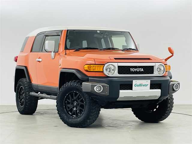 トヨタ ＦＪクルーザー カラーパッケージ 福島県 2013(平25)年 7.8万km オレンジ/ホワイト ４ＷＤ　/純正メモリナビゲーション/型式：NSZT-W62G/・バックカメラ/・社外ドライブレコーダー　/クルーズコントロール　/ステアリングスイッチ　/コーナーセンサー/ハロゲンヘッドライト/・フロントフォグライト/ワイパーデアイサー　/革巻きステアリング　/フロアマット　/ドアバイザー　/リモコンキー