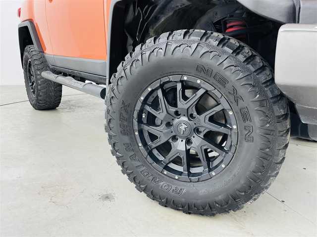 トヨタ ＦＪクルーザー カラーパッケージ 福島県 2013(平25)年 7.8万km オレンジ/ホワイト ４ＷＤ　/純正メモリナビゲーション/型式：NSZT-W62G/・バックカメラ/・社外ドライブレコーダー　/クルーズコントロール　/ステアリングスイッチ　/コーナーセンサー/ハロゲンヘッドライト/・フロントフォグライト/ワイパーデアイサー　/革巻きステアリング　/フロアマット　/ドアバイザー　/リモコンキー