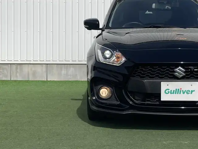 スズキ スイフト スポーツ 香川県 2022(令4)年 1万km スーパーブラックパール 登録時走行距離：9655km/デュアルセンサーブレーキサポート/レーンキープアシスト/レーダークルーズコントロール/クリアランスソナー/ブラインドスポットモニター/横滑り防止装置/パドルシフト/MTモード付AT/アルミペダル/シートヒーター/ビルトインETC/前後ドライブレコーダー/革巻きステアリング/ステアリングスイッチ/プッシュスタート/スマートキー