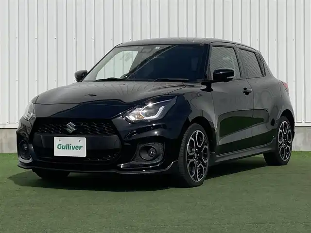 スズキ スイフト スポーツ 香川県 2022(令4)年 1万km スーパーブラックパール 登録時走行距離：9655km/デュアルセンサーブレーキサポート/レーンキープアシスト/レーダークルーズコントロール/クリアランスソナー/ブラインドスポットモニター/横滑り防止装置/パドルシフト/MTモード付AT/アルミペダル/シートヒーター/ビルトインETC/前後ドライブレコーダー/革巻きステアリング/ステアリングスイッチ/プッシュスタート/スマートキー