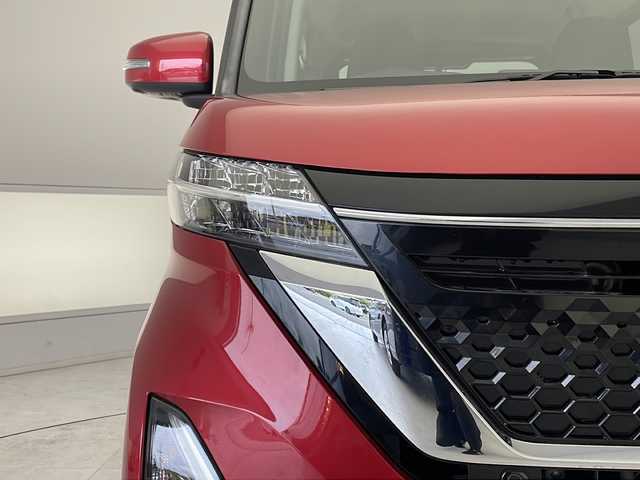 日産 ルークス ハイウェイスター X 愛知県 2021(令3)年 2.1万km スパークリングレッドM 衝突軽減システム/純正ナビ/全方位カメラ/パワースライドドア/ワンセグ/ＣＤ/Bluetooth/バックカメラ/イージーオープン機能/コーナーセンサー/純正アルミホイール/LEDヘッドライト/ドライブレコーダー/ステアリングスイッチ/スマートキー/プッシュスタート