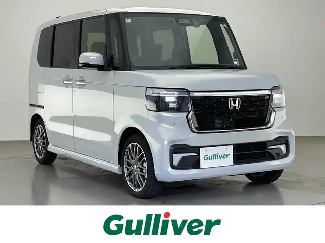 ホンダ Ｎ ＢＯＸ カスタム ターボ 愛知県 2024(令6)年 0.4万km プレミアムサンライトホワイトパール 純正９型ホンダコネクトナビ　フルセグＴＶ　カープレイ　ハーフレザー　シートヒーター　ＥＴＣ　両側パワースライドドア　ホンダセンシング　衝突軽減　追従クルコン　パドルシフト　純正ドラレコ　ＬＥＤ　禁煙車