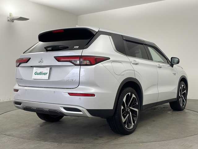 三菱 アウトランダー ＰＨＥＶ G 兵庫県 2021(令3)年 4.1万km ホワイトダイヤモンド ・純正ナビ&TV&Bluetooth&USB接続&Android Auto/・充電ケーブル付き/・マイパイロット/・レーダークルーズコントロール［ACC］/・車線維持支援機能［LKA］/・ブラインドスポットモニター［BSM］/・衝突被害軽減システム/・オートライト/・オートマチックハイビーム/・フロントワイパーデアイサー/・AC1500W電源/・レーンキープアシスト/・盗難防止装置/・アラウンドビューモニター/・前後ドライブレコーダー/・電動リアゲート/・ハーフレザーシート/・パワーシート（運転席）/・シートヒーター/・ステアリングヒーター/・三列シート/・純正アルミホイール（２０インチ）/・純正フロアマット/・ビルドインETC2.0 /・ワイヤレス充電/・パドルシフト/・ステアリングスイッチ/・オートブレーキホールド/・LEDヘッドライト/・フォグランプ/・W＋サイドエアバック/・カーテンエアバック/・AACエアコン/・スマートキー