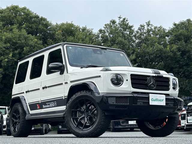 メルセデス・ベンツ ゲレンデヴァーゲン Ｇ４００ｄ マヌファクトゥーアエディション 東京都 2021(令3)年 6.1万km ダイヤモンドホワイト ワンオーナー/マヌファクトゥーアエディション/ガラススライディングルーフ/ブラックナッパ革シート/12.3インチワイドディスプレイナビ/・Burmesterサウンドシステム/・メルセデスミーコネクト/・フルセグTV/360°カメラ/レーダーセーフティパッケージ/・レーンアシスト/・ブレーキアシスト/・ブラインドスポットモニター/ブラックスモークマルチビームLEDヘッドランプ/大型オーバーフェンダー/ブラウンハイグロス木目調ステアリング/前席シートベンチレーション/シートヒーター/後席シートヒーター/社外アルミホイール20インチ（VOSSEN）/純正フロアマット/純正背面タイヤカバー車載/保証書/取扱説明書/スペアキー
